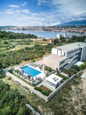 Family friendly apartments with a swimming pool Novalja, Pag - 15882